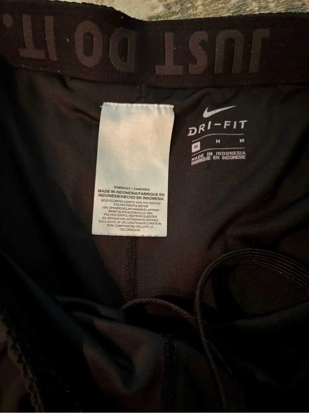 Nike Women's Dark Gray Athletic Running Shorts with Reflective Swoosh